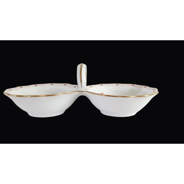 This Herend Chinese Bouquet Rust Porcelain Handled Double Salt Cellar features a beautiful floral pattern with 24K gold...