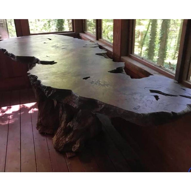 This is a early to mid-century Live Edge Redwood Burl Table. It is approximately 109" long, 46" wide at its widest point,...