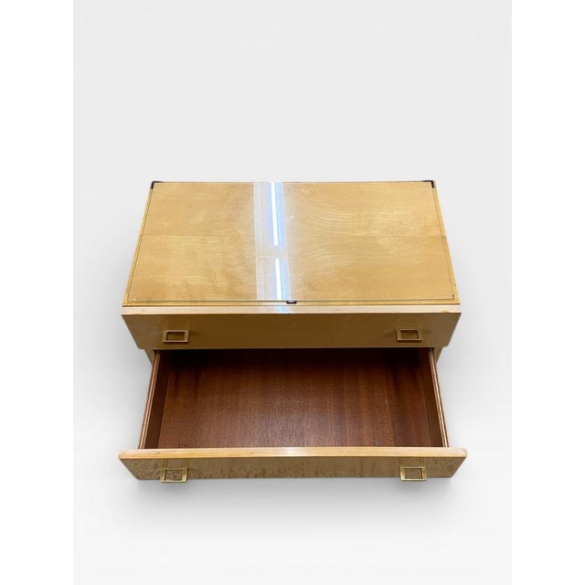 This elegant mid-century modern nightstand originates from Germany and impresses with its timeless design and high-quality...