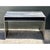 This vintage metal console table embodies a sophisticated modern aesthetic, featuring a remarkable faux wood grain finish...