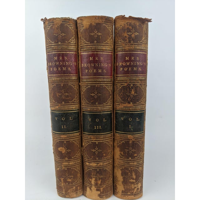 A beautifully aged complete three-volume antique set of The Poems of Elizabeth Barrett Browning, published in New York by...