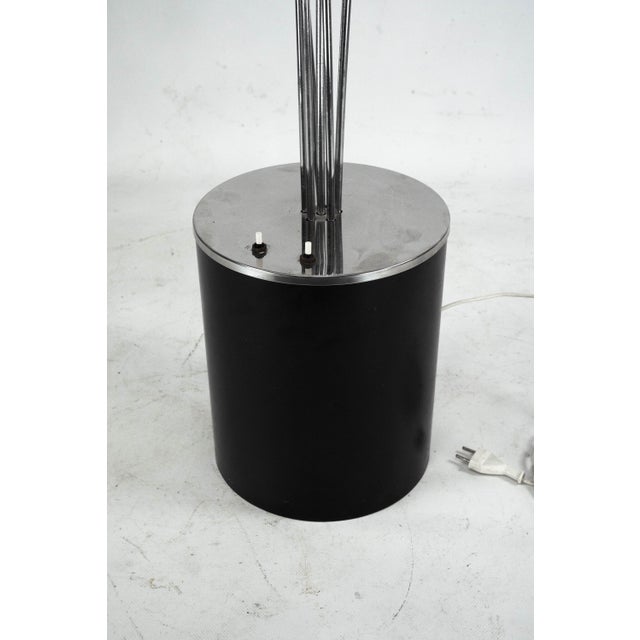 An iconic and strikingly stylish Italian Space Age floor lamp dating from the 1970s. This distinctive piece features...