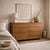Mid-century modern Heywood-Wakefield lowboy dresser with eight drawers, integrated pulls, and a warm blonde wood finish....