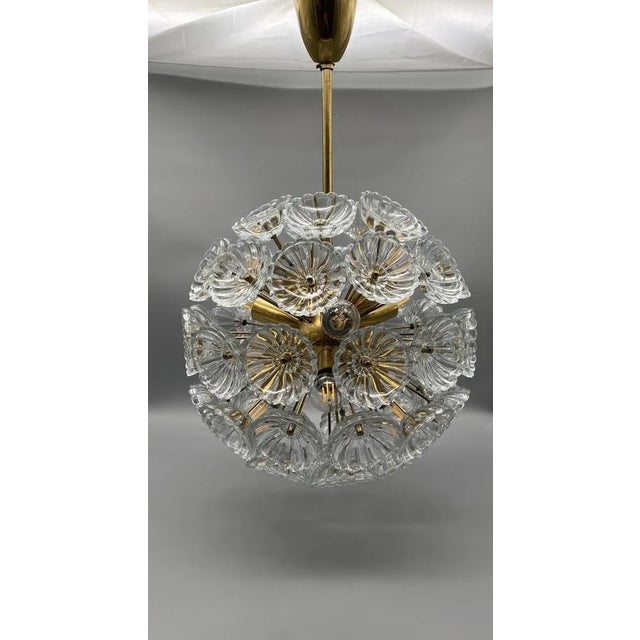 A ceiling lamp *the design was a factory design from the 50s for the veb crystal lamp ebersbach. *gdr around 1960...