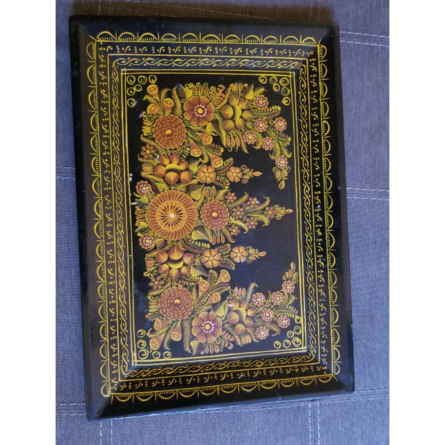 This lovely Russian tray measures approximately 15 x 18 and is a little more than a half an inch deep. This dates to the...