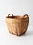 A vintage French Country style woven basket with a rounded form, wrapped side handles, bentwood reinforcing ribs, and...