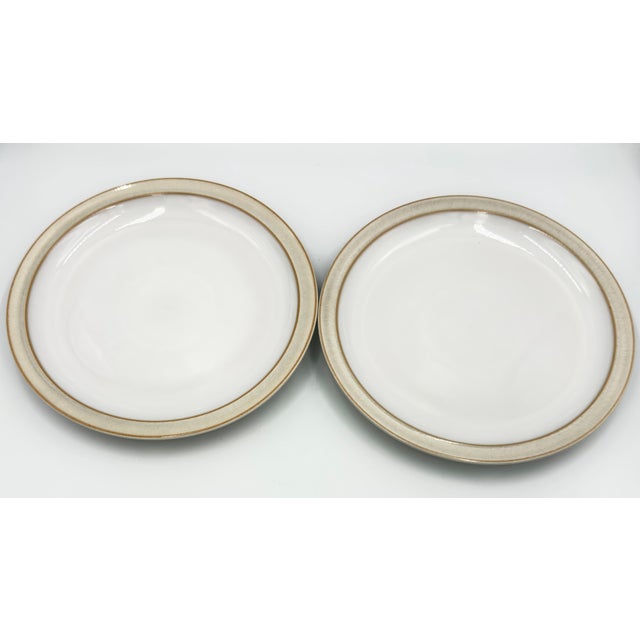 Timeless elegance of this exquisite 2-piece set of Denby Stoneware Plates. Crafted with exceptional quality in England,...