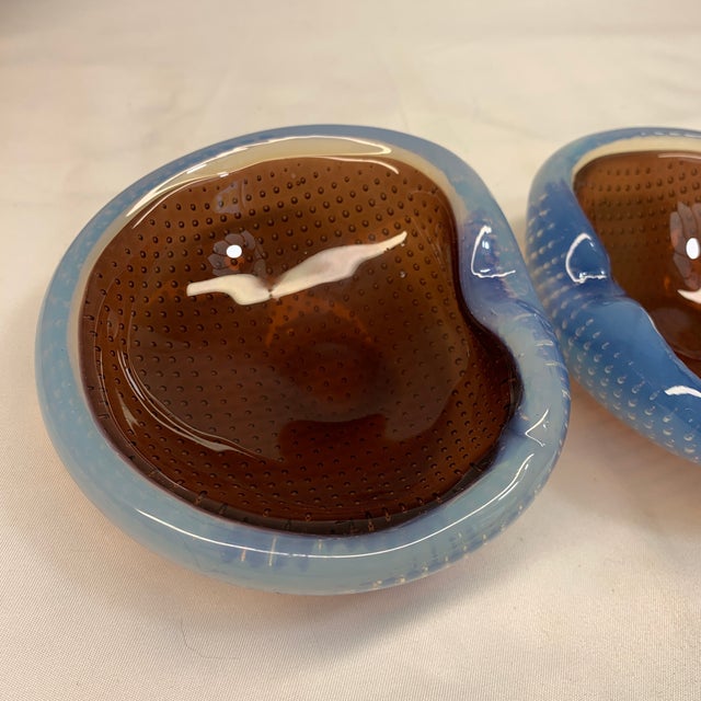 Elevate your collection with this exquisite pair of vintage mid-century modern Murano art glass geode bowls. Beautifully...