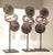 Early 20th Century Dong Miao Tribal Silver Coil Counterweights on Display Stands, Set of 3 For Sale - Image 5 of 7
