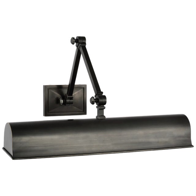 Jane 18" Double Library Light in Gun Metal Designer: Alexa Hampton Height: 7.5" - 9.75" Extension: 11" - 17.25" Backplate:...