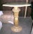 Gilt pedestal console with newer green faux marble wood top.
