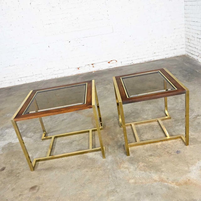 Wonderful pair of modern brass plated dark wood & smoked glass end tables in 2 sizes, 1 larger rectangle and 1 smaller...