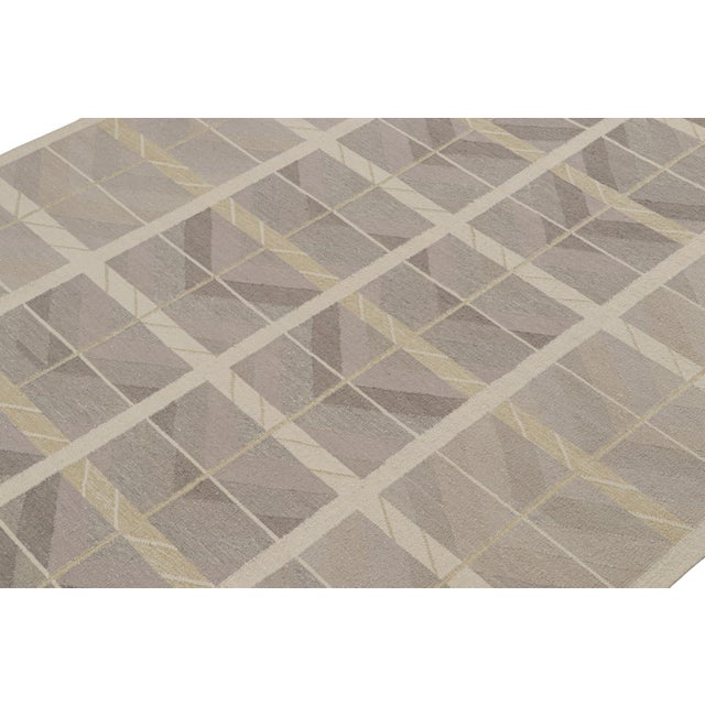 This 9x12 Swedish style kilim is from the Scandinavian rug collection by Rug & Kilim. Handwoven in silk, this flatweave...