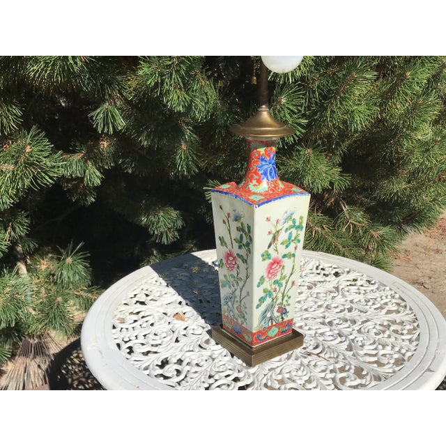 Antique Chinese Famille rose lamp on brass mount. Excellent floral depiction vivid colors.