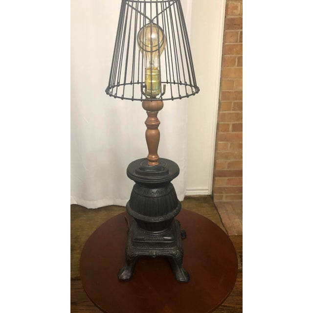 In great condition, works well. Includes Edison light bulb and wire lamp shade. dimensions 26”h (top of lamp shade) 20.5”h...