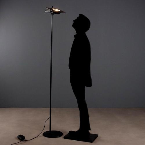 Vintage floor lamps with cast iron base, metal rod and adjustable reflector. This piece is attributed to the mentioned...