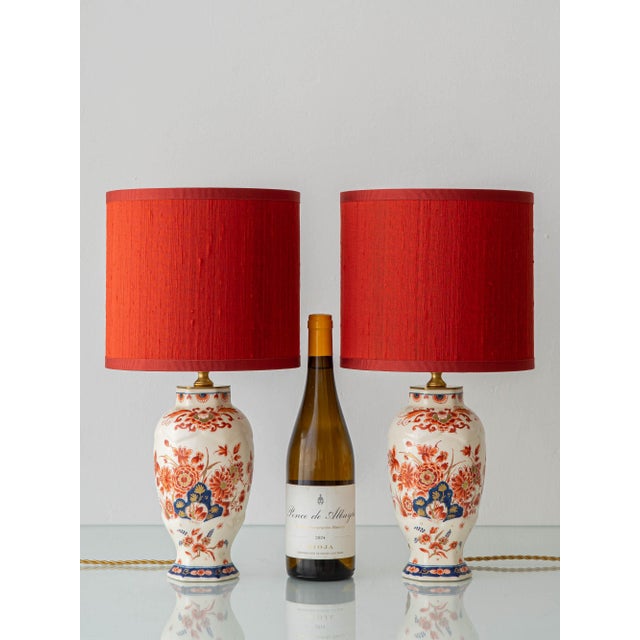 Pair of Royal Delft "Pijnacker" table lamps, converted from a matched set of 1975 vases by De Porceleyne Fles — the last...