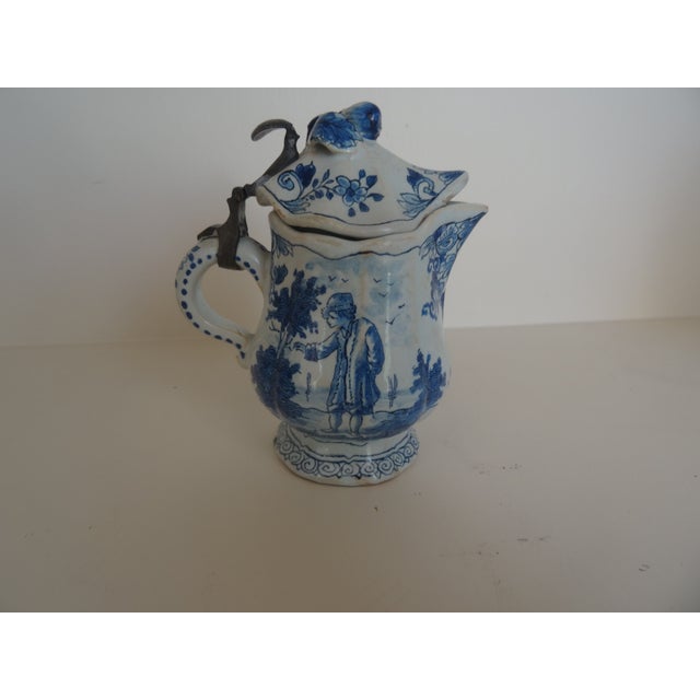 Small Highly collectible 18th century delft lidded pitcher by Hugo Brouwer (1740-1817) Sign by HB on bottom. His pieces...