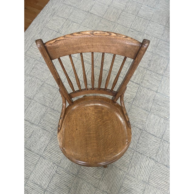 An original Bankers Chair from the Sheboygan Chair Company! Cast Iron swivel and tilt mechanism is in perfect condition,...