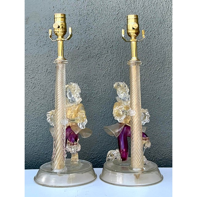 This exquisite pair of mid-century Murano glass lamps represents the height of Italian artisanal lighting, heavily...