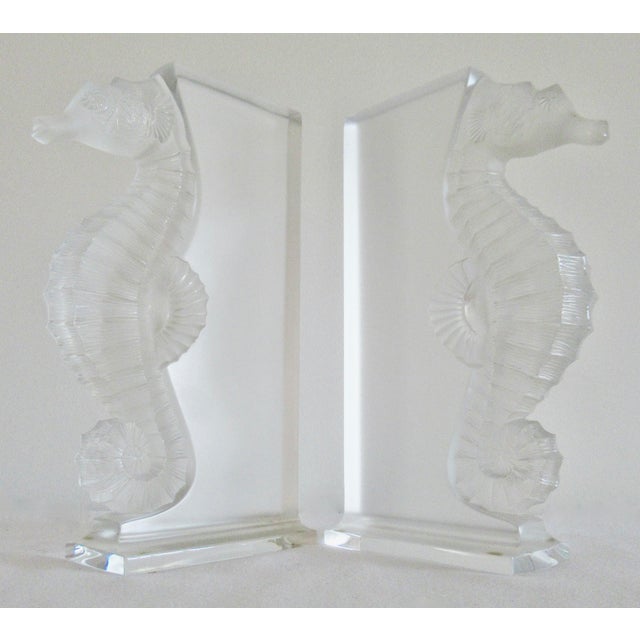 C.1998-2001; Lalique; Crystal "Sea-Horse," pair of bookends. These bookends have a frosted and clear polished, elements...