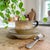 Experience the perfect blend of artistry and functionality with this Handmade Ceramic Coffee Cup and Saucer Set. Crafted...