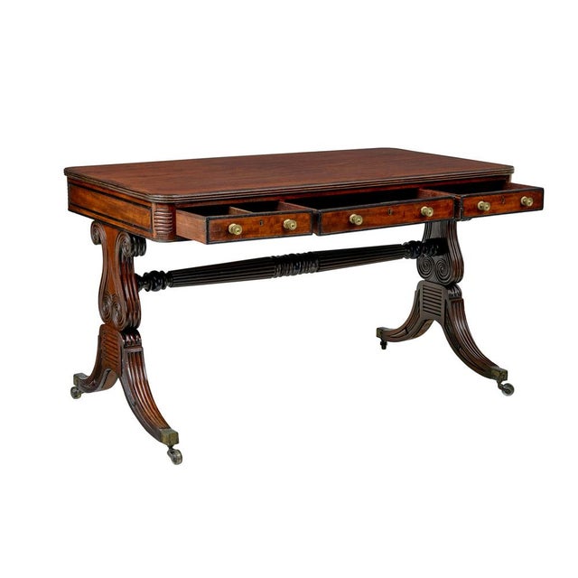 William IV period library table in it's original patina. Writing surface showcases the beautiful grain in the timber and...