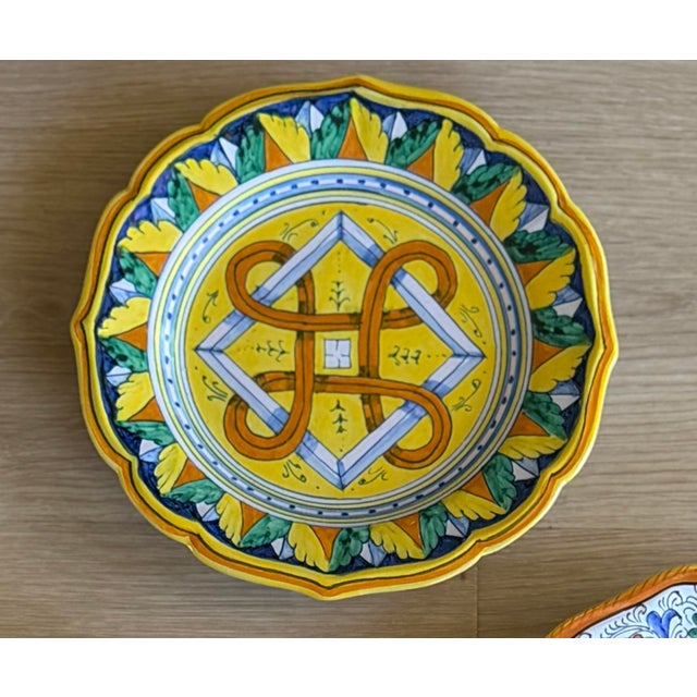 Beautiful collected set of six colorful Italian ceramic plates made for Cottura. Individually some of these plates sell...