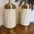 Fabulous pair of 1980's art deco lamps in solid brass with cream spiraled enameled center portion. Harps and finials...