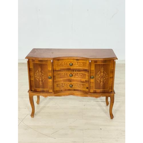 Stylish vintage chest of drawers in the Baroque style. This piece of furniture impresses with its decorative inlays,...