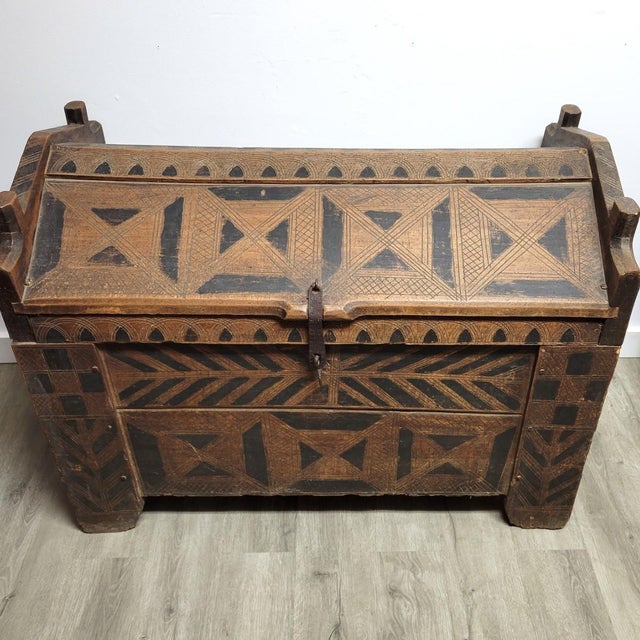 A mid-19th century Eastern European dowry chest, likely from the Carpathian highlands, constructed of heavy plank boards...