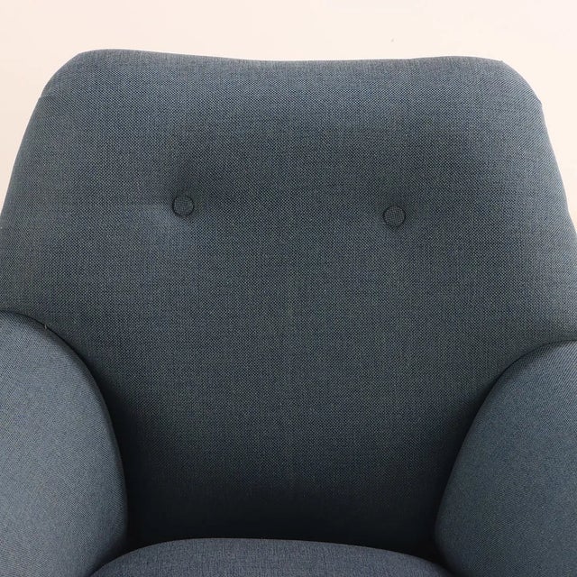 This striking pair of Mid-Century Modern lounge chairs captures the sculptural elegance and organic forms associated with...