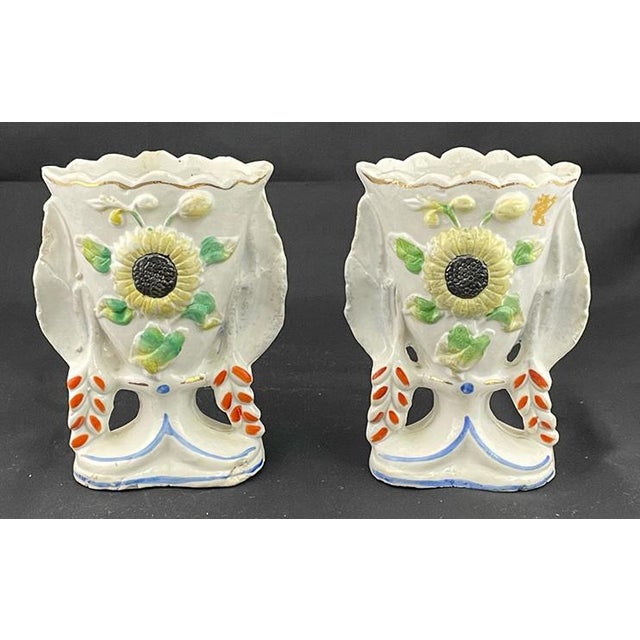 Brighten your space with these charming sunflower-designed spill vases. Perfect for small floral arrangements or single...
