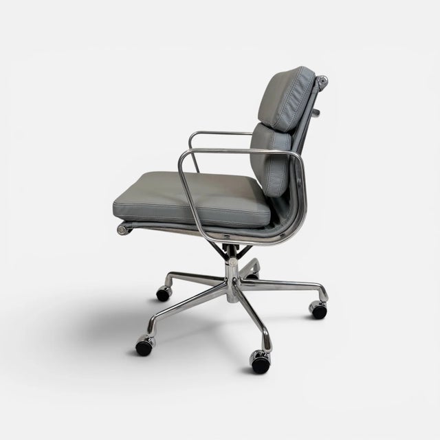 A beautifully restored Eames Aluminum Group Soft Pad Management Chair, originally designed by Charles & Ray Eames....