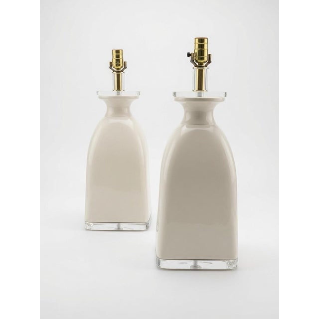 Vintage Lucite & off White Ceramic Large Scale pair of Lamps by Bauer Lamp Company is a stunning addition to any coastal...