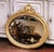 Decorate a powder room, hallway, or bedroom with this elegant antique wall mirror. Crafted in France circa 1890, the oval...