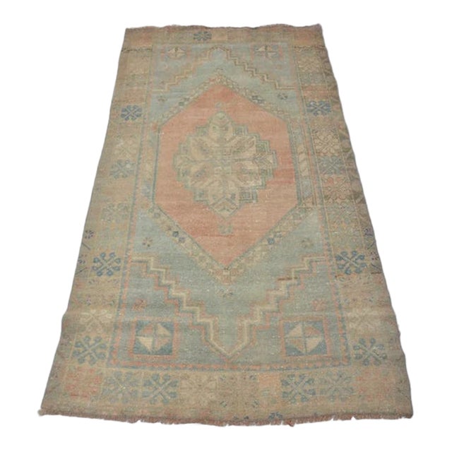 Handwoven Vintage Oushak With Faded Floral Medallion For Sale