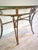 Vintage Hollywood Regency Italianate Glass Console Table With Ornate Gilt Iron Base For Sale - Image 9 of 10