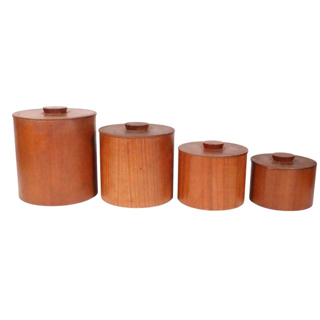 Chic Mid Century Danish Modern style teak canisters, Made in Japan by Otagiri. Circa 1960;s The set consists of four...