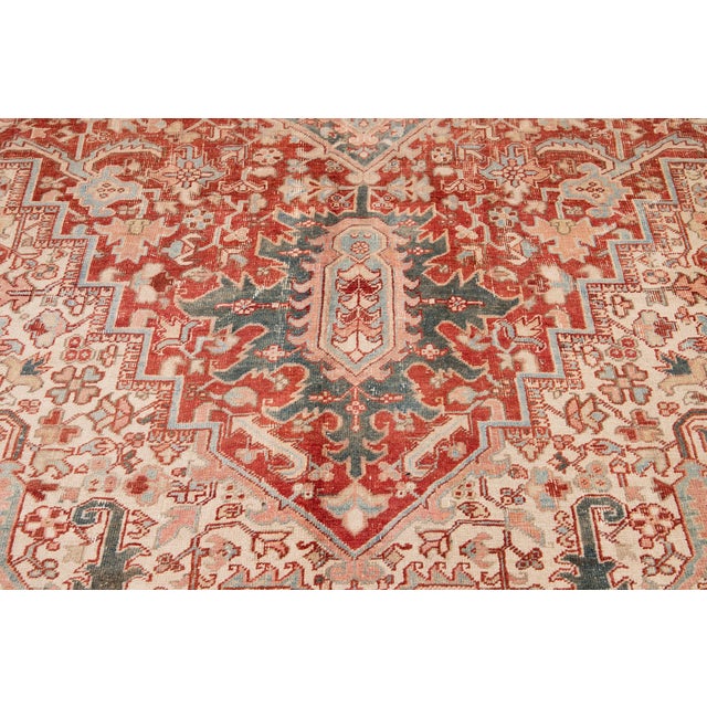 Antique Persian Heriz Wool Rug Handmade in Red Featuring a Medallion Motif For Sale - Image 4 of 10
