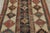 This 4x7 vintage Turkish Anatolian runner, handwoven in wool circa 1950–1959, features a striking geometric layout with...