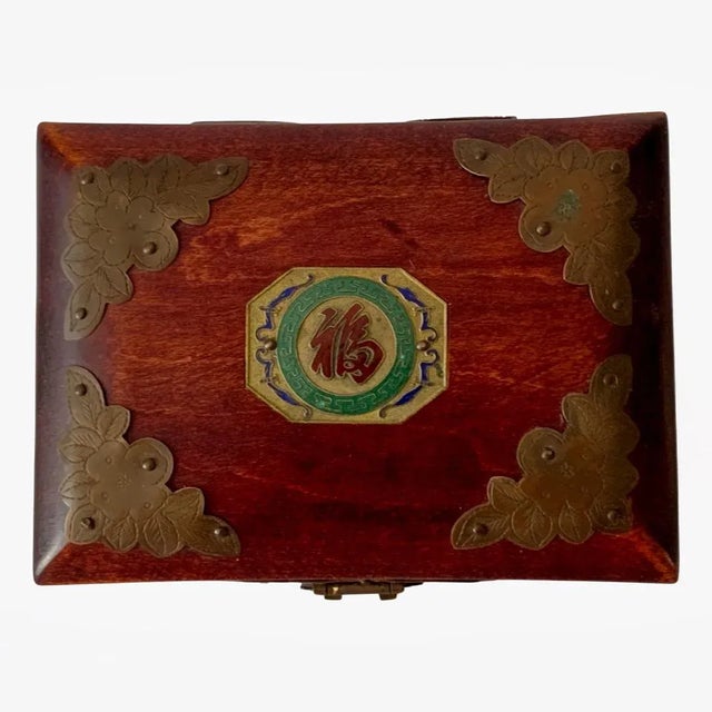 Vintage Chinese Rose wood enameled jewelry box with carved brass hardware. Interior with cushioned silk lining in bright...