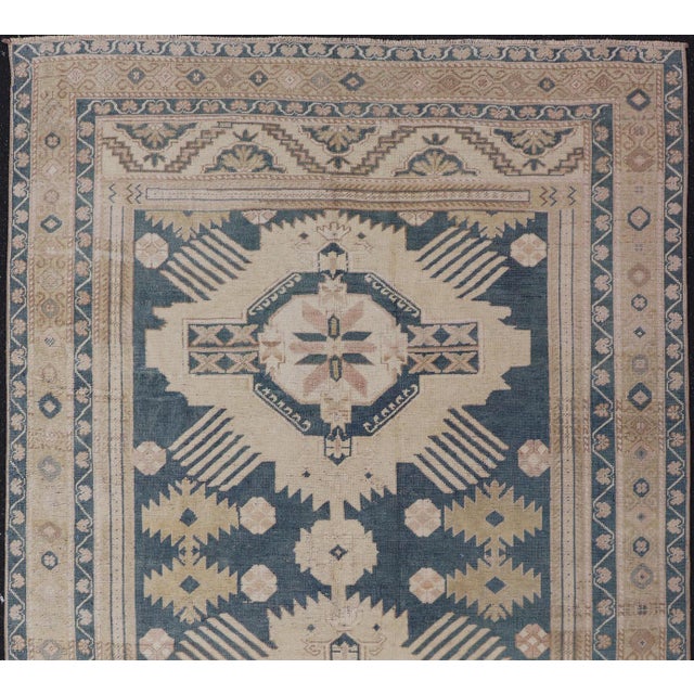 Measures 5'5" x 8'10" Blue background Turkish Oushak Rug / Keivan Woven Arts / rug / TU-MTU-5069 / country of origin...