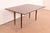 A sleek and stylish Mid-Century Modern solid walnut drop-leaf harvest dining table By Jack Cartwright for Founders...