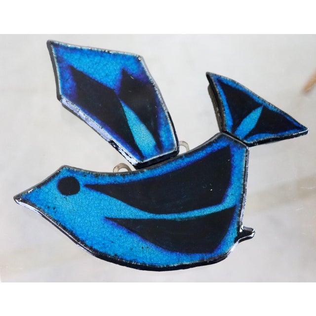Very decorative and beautifully executed wall hanger attributed to Konraad Galaaen. Made from ceramics and beautiful in...