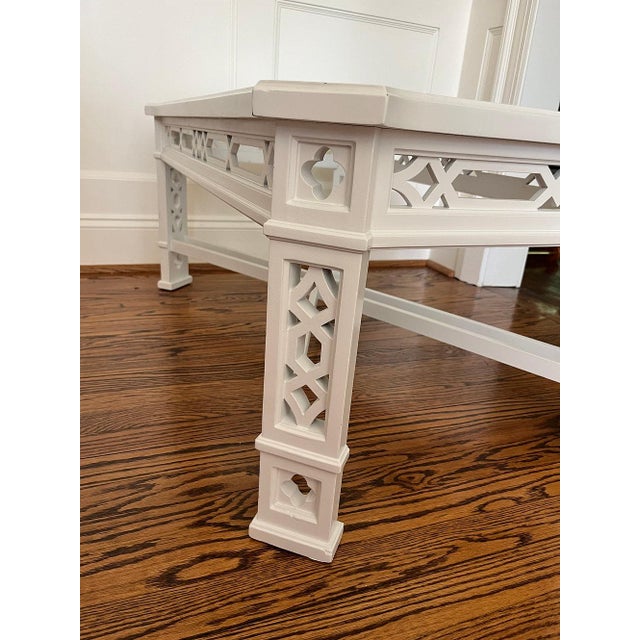 Hollywood Regency style, Chinese Chippendale-inspired coffee table with bold modern fretwork. Handsome double X...