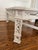 Hollywood Regency style, Chinese Chippendale-inspired coffee table with bold modern fretwork. Handsome double X...