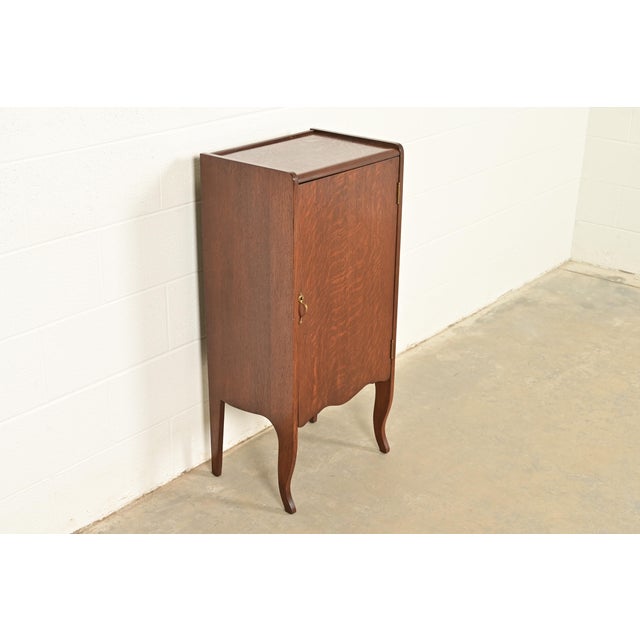 R. J. Horner & Co. Antique Victorian Carved Tiger Oak Music Cabinet, Circa 1900 For Sale - Image 4 of 14