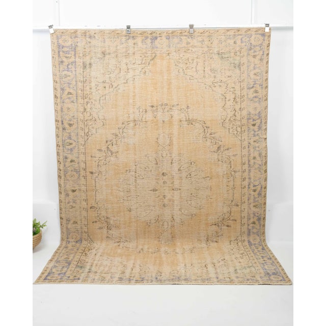 Vintage Turkish Hand-Knotted vintage rug is a semi-antique vintage Area rug.'70s Eastern region of Turkey's unique rug is...
