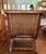 Bring tropical elegance and resort-inspired comfort to your home with this striking vintage plantation-style lounge chair...